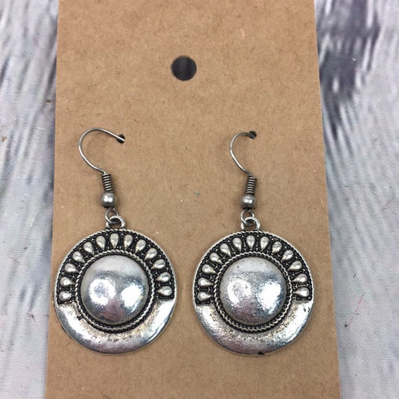 unbranded Jewelry - 5/$25 Rocker silver tone imprinted round dangle